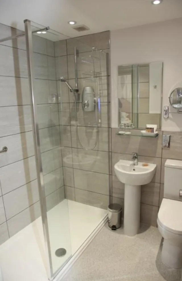 غرفة تنفيذية بسريرين منفصلين بغرفة نوم واحدة، Burts Hotel 1/1