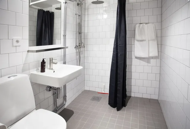 استوديو بغرفتين مع أريكة بمطبخ صغير، First Hotel The Studio 2/2