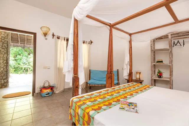 غرفة قياسية بثلاثة أسرّة بإطلالة على الحديقة، Mvuvi Boutique Resort 2/3