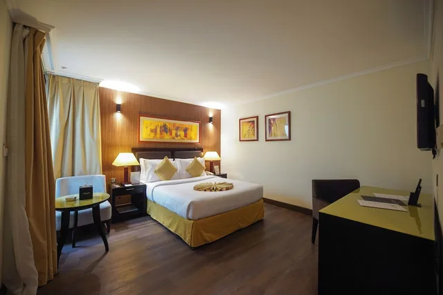 غرفة قياسية بسرير كوين للمدخنين، Villaggio Hotel and Resort Abu Dhabi 2/3