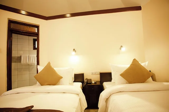 غرفة تقليدية بسرير كينج وسرير فردي، Keys Hotel 4/10