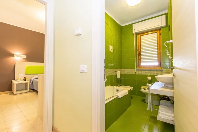 غرفة سوبيريور رباعية بأربعة أسرّة، Hotel Residence Ulivi E Palme 4/5