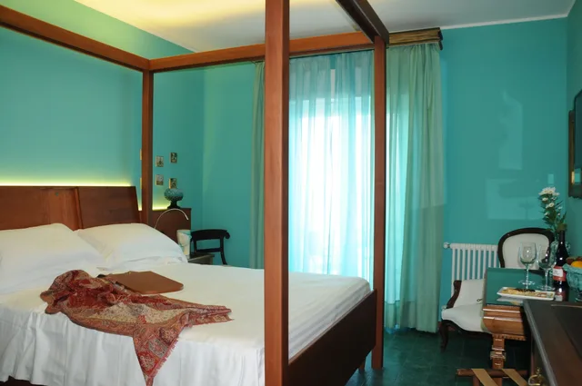 غرفة ديلوكس بسرير كينج بإطلالة على البحر بشرفة، Hotel Palladio 7/10