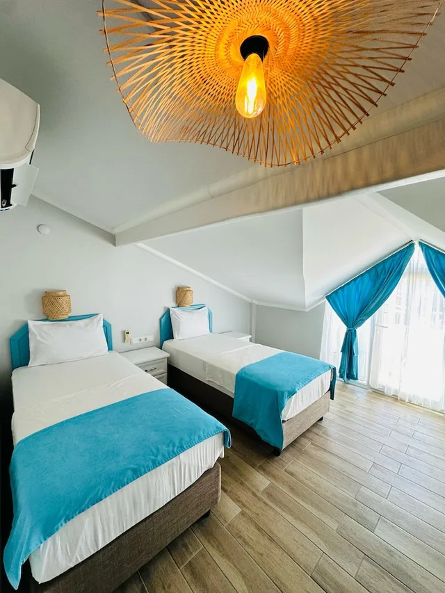 غرفة اقتصادية بسريرين منفصلين بحمام خاص، Bora Hotel 2/3