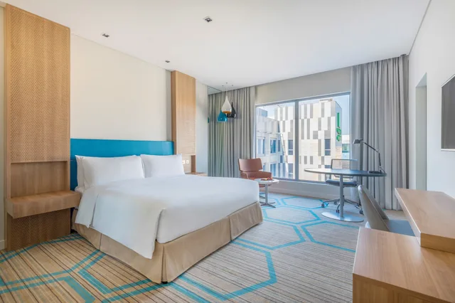 غرفة قياسية بسرير فردي، Holiday Inn Doha - The Business Park 1/5