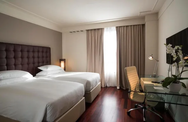 غرفة بسرير فردي بإطلالة على المدينة، DoubleTree by Hilton Florence Metropole 4/8