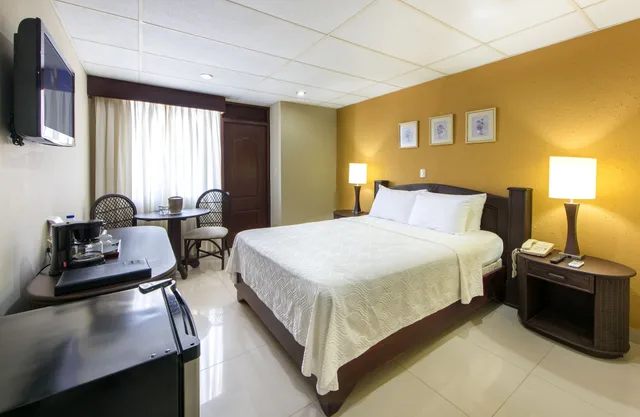 غرفة تنفيذية بسرير كوين، Centro Plaza Hodelpa 2/3