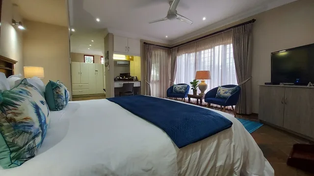 غرفة تنفيذية بسرير كينج بإطلالة على الحديقة، Matumi Golf Lodge 2/3