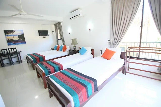1 Bedroom, Deluxe, Triple, 1 King and 1 Single Beds, Lake View, Smoking, Oruthota Chalets 2/4