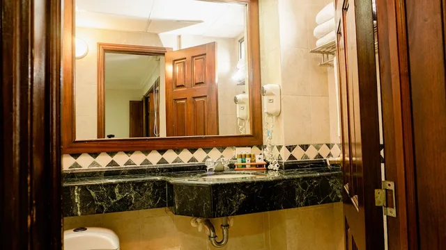 غرفة ديلوكس بسرير كينج وسرير فردي وثلاثة أسرّة، Windsor Barranquilla Hotel 7/8
