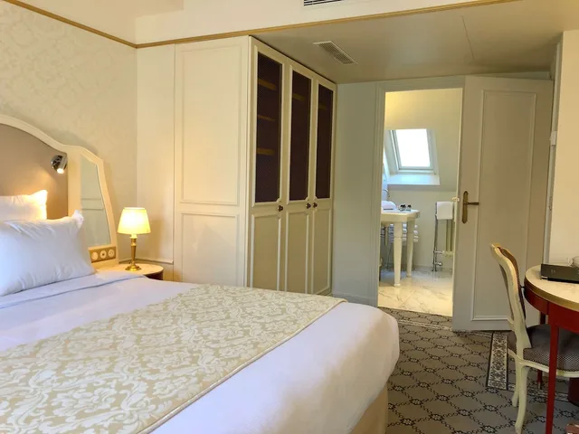 جناح جونيور بسريرين منفصلين مع أريكة، Hotel Mayfair Paris 2/6