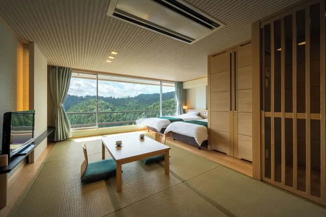 غرفة يابانية غربية بسريرين منفصلين وفرشتي فوتون بإطلالة على الجبل، Hotel Matsushima Taikanso 2/2