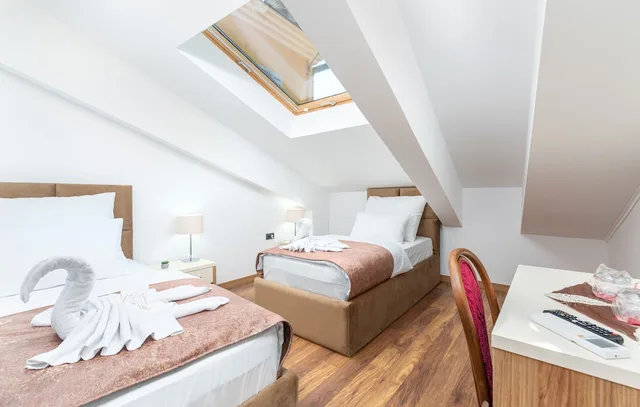 غرفة أساسية بسريرين منفصلين، Hotel Dua Residence 1/4