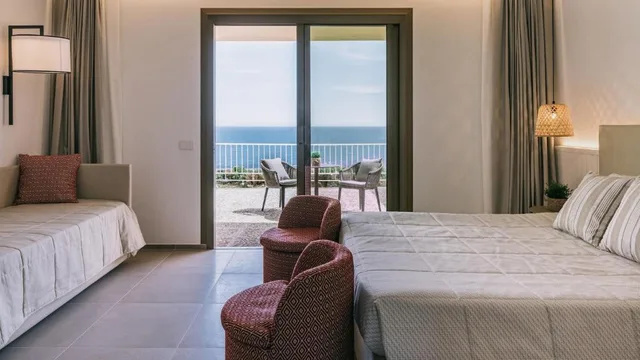 Deluxe Quad Room Sea View، Mangia's Torre del Barone Resort & Spa 1/2