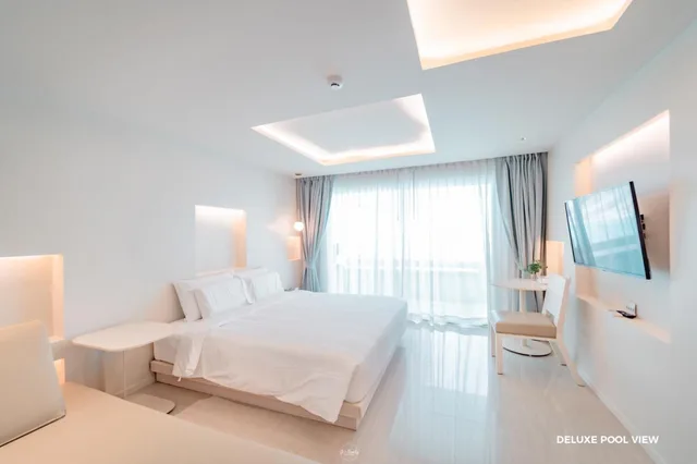 غرفة ديلوكس بسرير مزدوج أو سريرين منفصلين بإطلالة على المسبح، Prima Hotel Pattaya 1/4