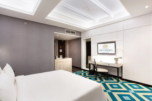 غرفة غراند ديلوكس بسرير كينج وسرير كوين، Hotel Des Indes Menteng 2/3