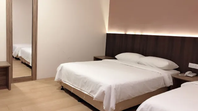 غرفة سوبيريور ثلاثية بسرير كوين وسرير فردي، Tumike Hotel 1/3