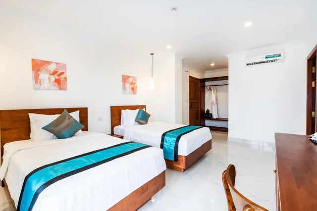 غرفة ديلوكس عائلية بسرير كينج وسريرين منفصلين بشرفة، Le Kree Downtown Hotel 1/3