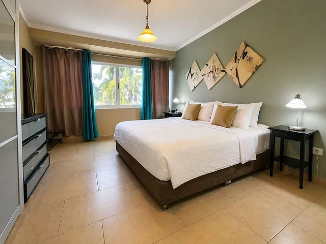 شقة بسرير كينج وسرير فردي بإطلالة على البحر بشرفة بغرفتي نوم، Eden Beach Resort 1/4