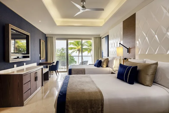 2 Bedrooms, Diamond Club, Chairman, Luxury, Suite, 1 King and 2 Queen Beds, Ocean Front, 2 Sofa، Royalton Grenada, an Autograph Collection All-Inclusive Resort 5/7