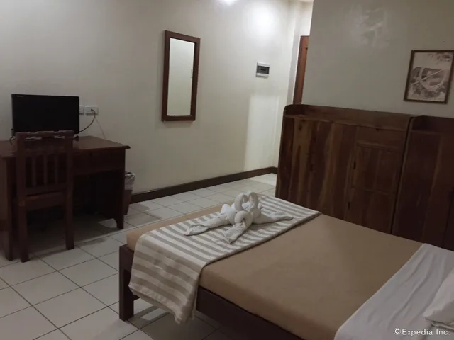 غرفة بسرير مزدوج وسرير فردي، El Haciendero Private Hotel 2/3