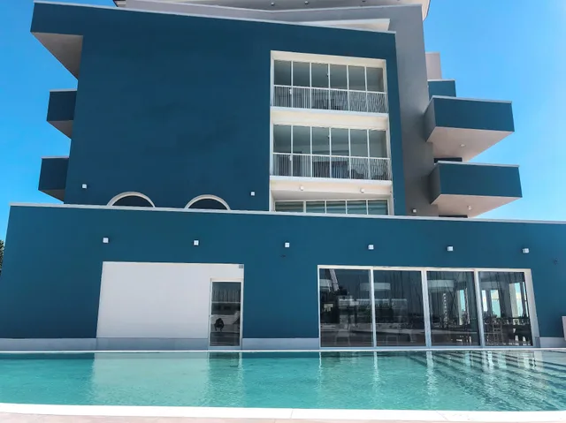 Family Suite, Queen and Twin Beds, Lagoon View, Sofa، Mosella Suite 1/5