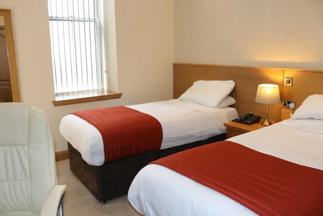 غرفة قياسية بسريرين منفصلين، The City Hotel 1/6