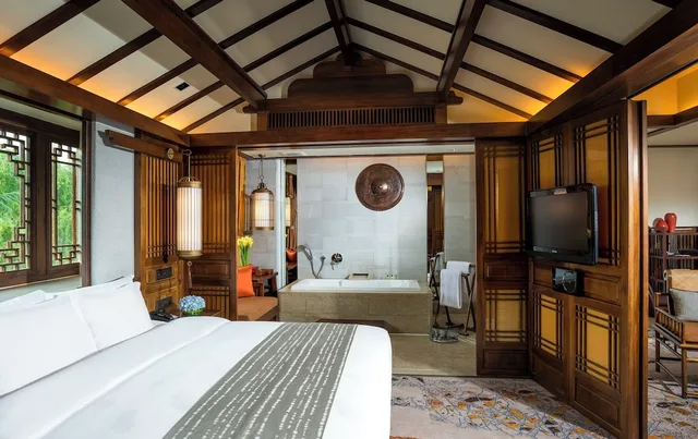 جناح جونيور بسريرين منفصلين مع دخول صالة النادي، INTERCONTINENTAL LIJIANG ANCIENT TOWN RESORT 1/5
