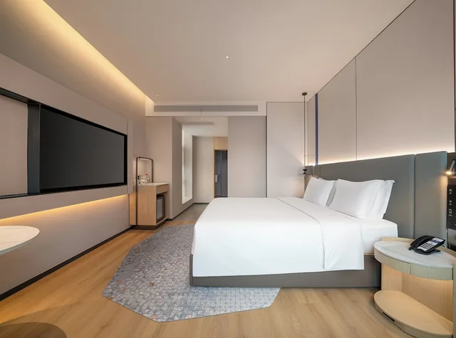 غرفة قياسية بسرير كينج، YiWu Zhonglian Kaixin Hotel 1/7