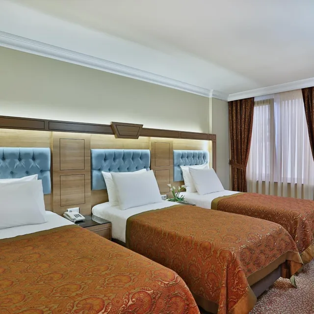 غرفة ثلاثية، Budo Hotel 5/10