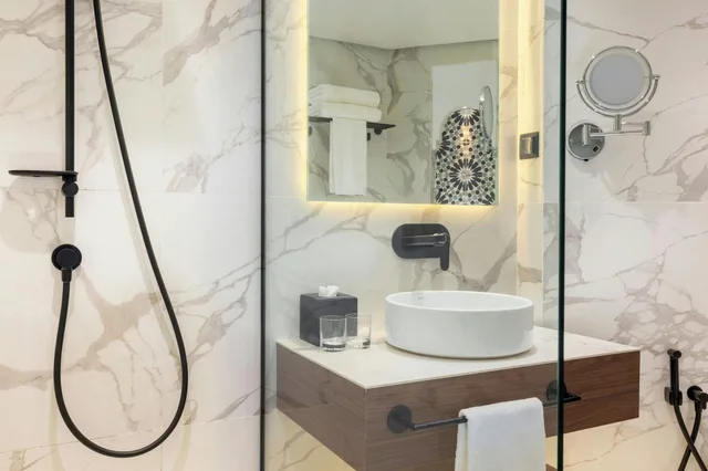 غرفة بسريرين منفصلين بإطلالة على الحديقة، Marriott Meridien N'fis 3/16