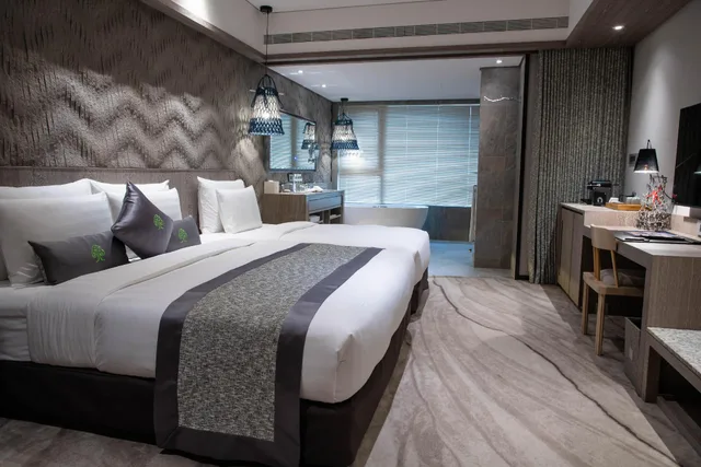 غرفة ديلوكس ثلاثية بسرير كوين وسرير فردي، ARTREE HOTEL 3/3