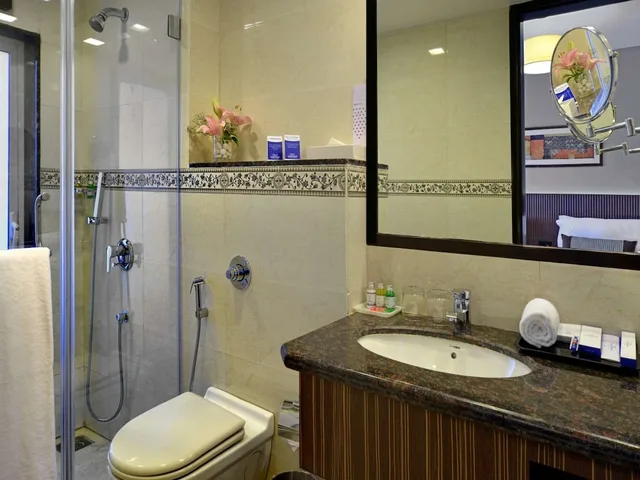 Deluxe, King Bed, Residency Sarovar Portico 5/6