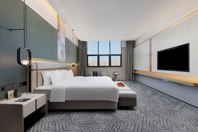 غرفة تنفيذية بسرير كينج، UrCove by Hyatt Dongguan Fenggang 1/4