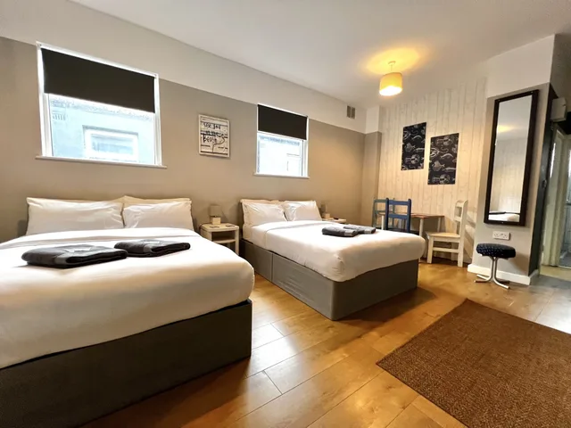 شقة عائلية بسريرين كوين مع أريكة، Central Cove Guesthouse 3/4