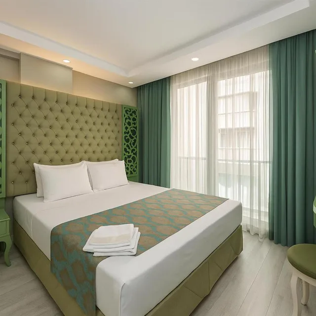 غرفة ديلوكس بسرير مزدوج، Green Garden Hotel 1/9