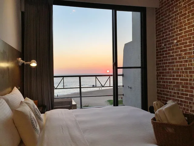 غرفة ديلوكس بسرير مزدوج بإطلالة على البحر بشرفة، Minimi Inn - Sailrock Beach House 5/8