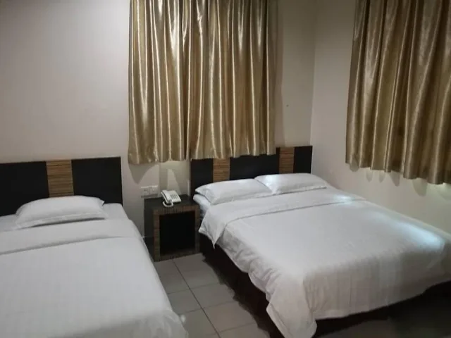 غرفة عائلية بسرير كوين وسرير فردي، Hotel Traveller 1/3