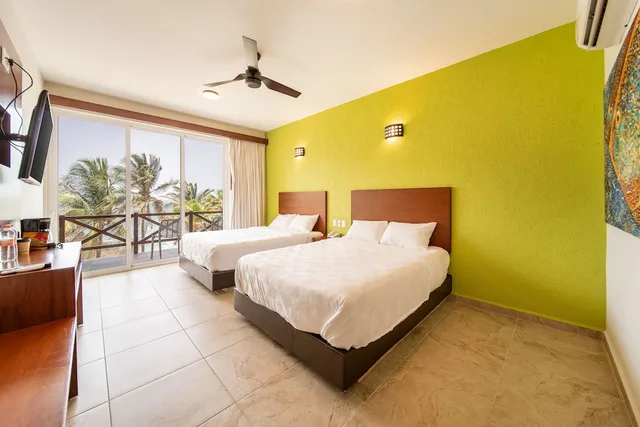 غرفة قياسية بسريرين كوين، Villas Coral Huatulco 1/4