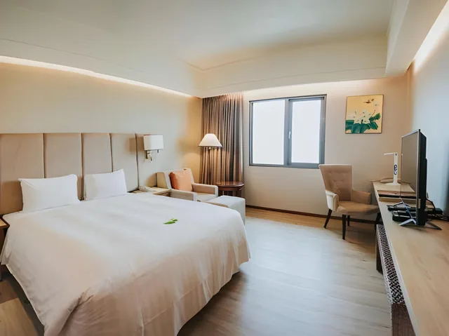 غرفة بزنس بسرير كوين، Jia Hsin Garden Hotel 1/2