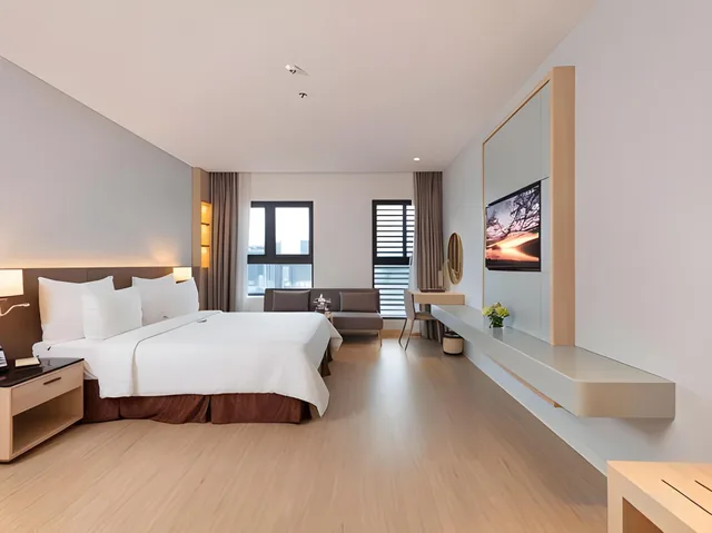 غرفة متصلة فاخرة عائلية بسرير مزدوج بإطلالة على المدينة بإطلالة جزئية على البحر، DQua Hotel and Apartment 1/2