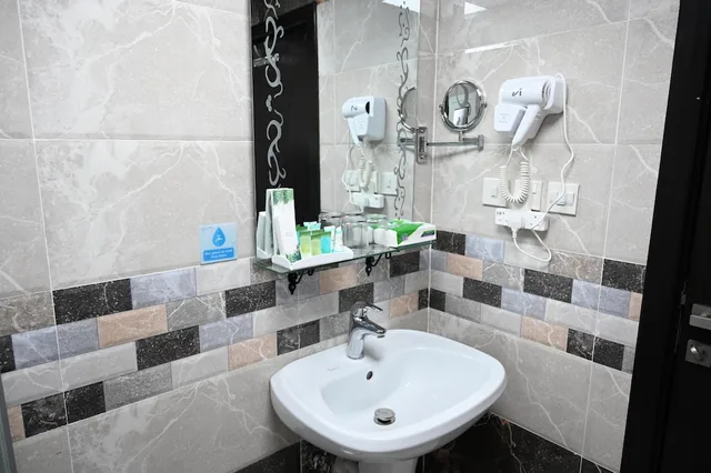 غرفة بسريرين منفصلين، فندق فيوليت ينبع(Violet Hotel) 4/7
