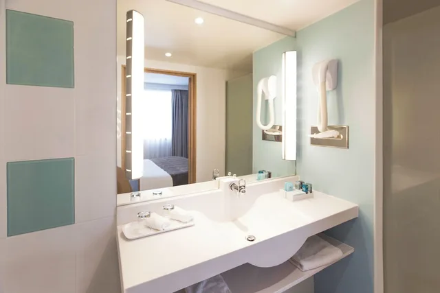 غرفة كلاسيكية عائلية بسرير مزدوج مع أريكة مع أريكة، Novotel Paris Centre Gare Montparnasse 7/7
