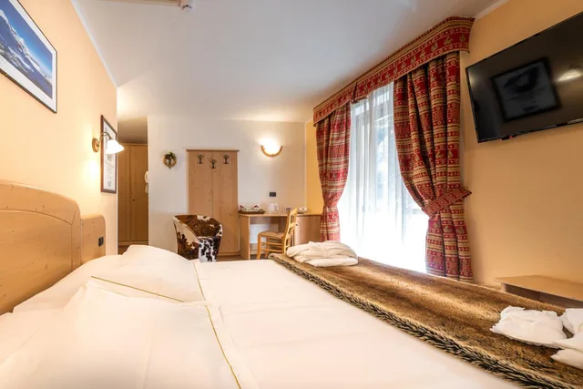 غرفة بسرير مزدوج أو سريرين منفصلين، Hotel Lo Scoiattolo 1/8