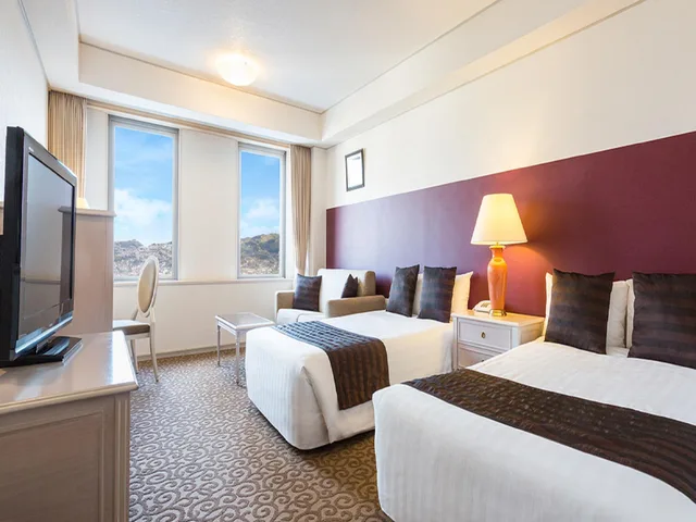 غرفة بريميوم بسريرين منفصلين في الطابق العلوي، Luke Plaza Hotel 1/1