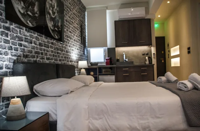 Deluxe, Suite, King Bed, Temple View, Sofa، Athens Version Luxury Suites 5/8