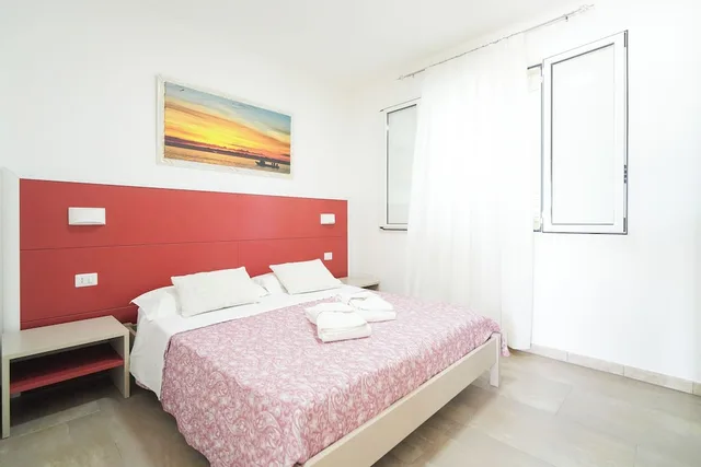 جناح ديلوكس بسرير كوين وسريرين فرديين، Residence La Pineta - Campsite 1/10