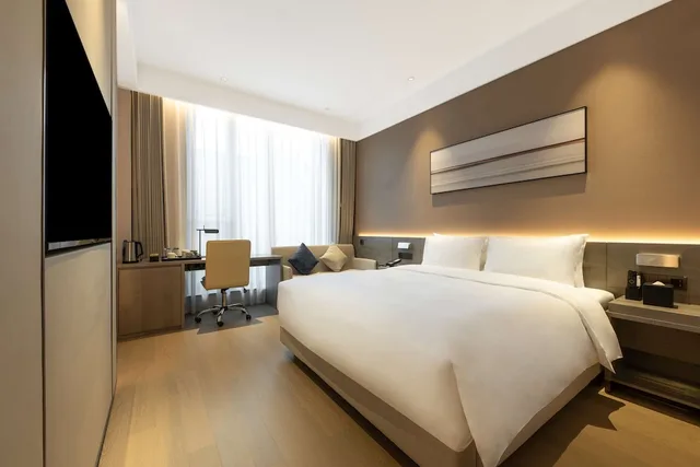 غرفة بسرير كينج، Huidong Business Hotel 1/2