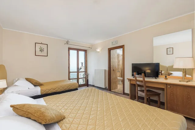 غرفة كلاسيكية ثلاثية بسرير مزدوج وسرير فردي، Relais La Fattoria 3/5