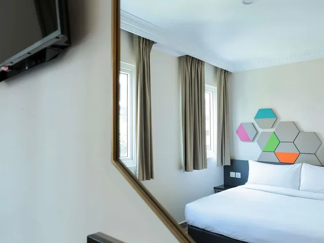 غرفة ديلوكس بسرير مزدوج، Ibis Budget Singapore Jasmine 2/7